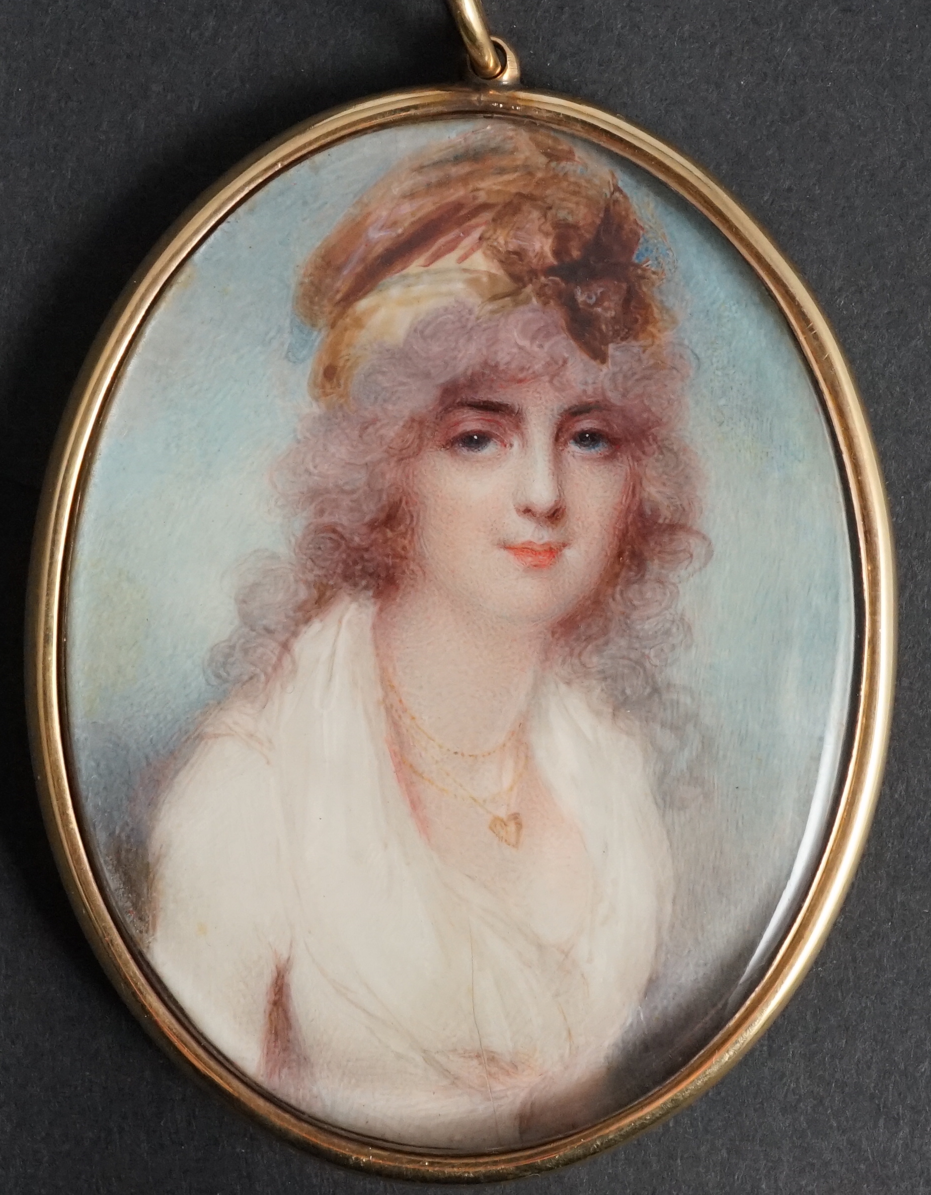 Mrs Anne Mee, née Foldsone (British, 1775-1851), Portrait miniature of a lady wearing a white dress and gold chain with a heart shaped locket, watercolour on ivory, 7.6 x 5.8cm. CITES Submission reference HQJ8KNQ9